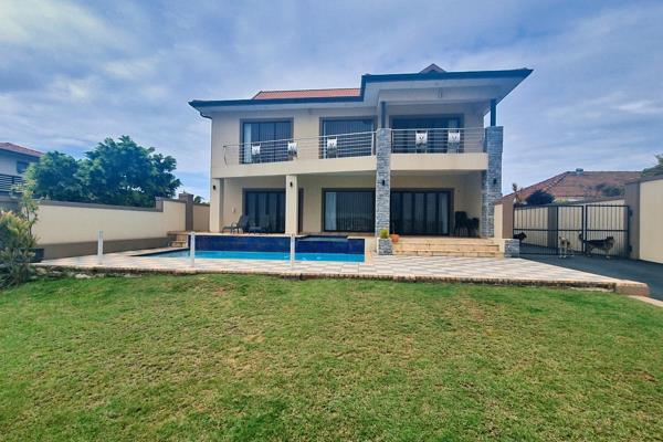 Step inside the sanctuary of pure elegance. This home is a masterpiece of design and craftsmanship. The spacious, light-filled lounge ...