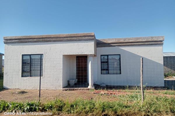 This is a two bedroom house that is nearly renovated it has a fire place and a big beautiful yard it is located in Lenasia near ...