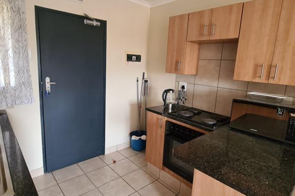 Very neat and well-maintained two-bedroom unit with a full bathroom.  
Open plan kitchen with built-in cupboards, space for a washing ...