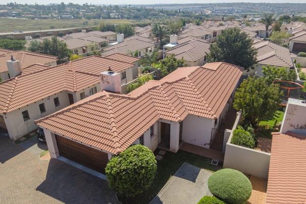 Main Ensuite.
Modern kitchen with granite tops.
Open plan living area.
Patio with built in braai.
Double automated garage.
Well ...