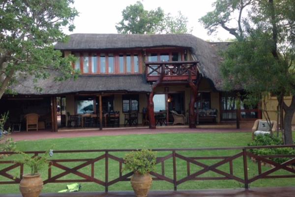 With soft neutral bushveld colors throughout and massive windows bringing the African wildlife indoors, guests will experience ...