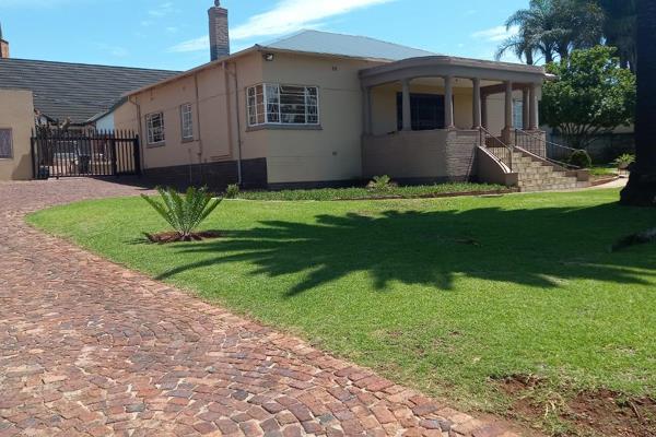 Neat family home on a double stand up for grabs...Property has wooden floors and pressed ceilings ,with a spacious entrance ...