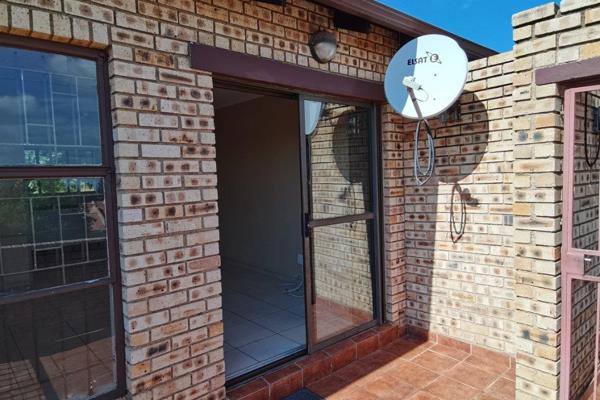 1st floor apartment in Amorosa Ridge Complex, Ruimsig, featuring 2 spacious bedrooms, an ...