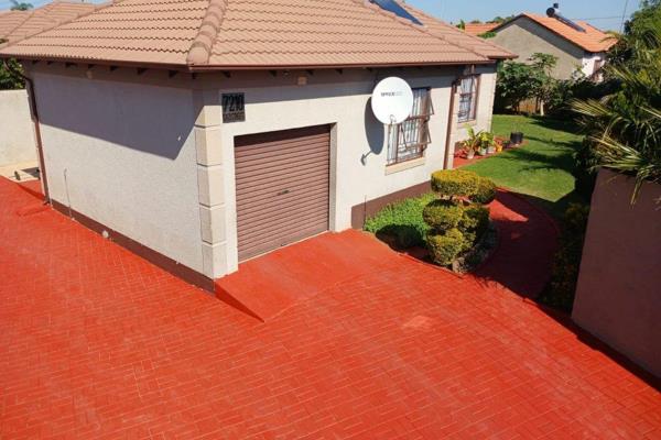 This stunning home has a very well-maintained garden with a stunning lawn and a built-in braai. 
Features: 
Living area 
Kitchen 
3 ...