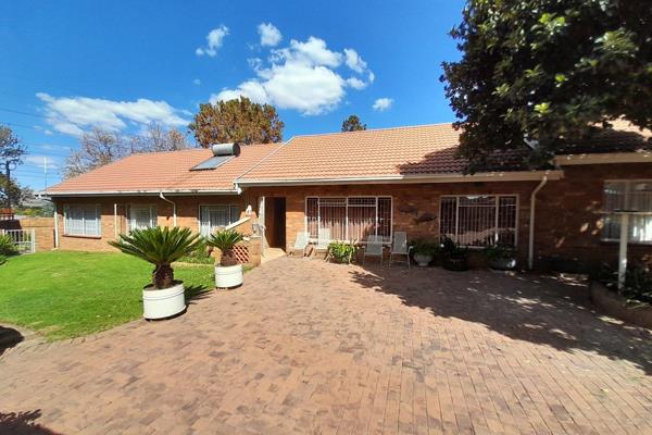 This low maintenance four-bedroom face brick family home on a large 1254m&#178; stand in Bergsig is the perfect family home with a ...