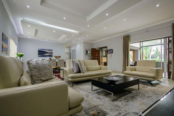 Step into refined luxury at this exquisite 4-bedroom haven nestled in the heart of Greenside. 

Entertain with ease in the spacious ...