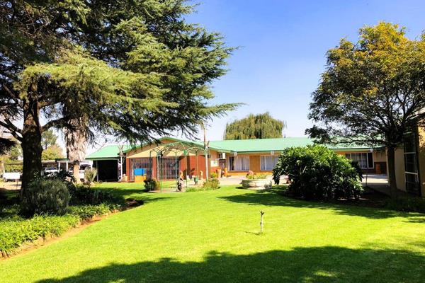 This small holding offers 21 680 square meter agriculture land and boasts with endless possibilities...The main house features a tiled ...