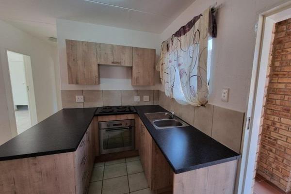 This spacious 2-bedroom, 1-bathroom apartment is in a secure complex with 24-hour ...