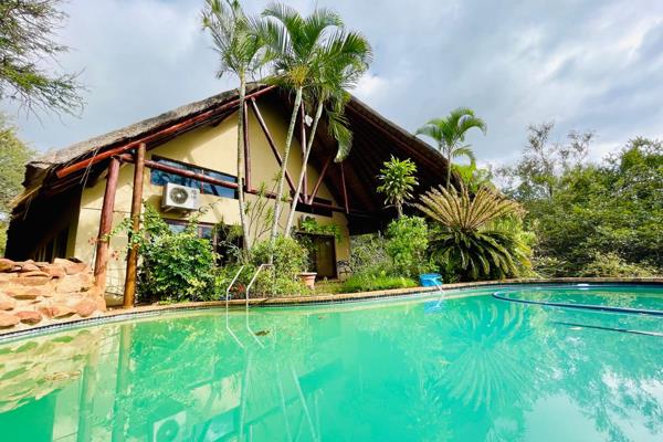 PRIVATE HIDDEN GEM LOCATED AT THE FOOT OF THE MAJESTIC MOUNTAINS

This house, with its high thatched roof and refreshing verandah ...