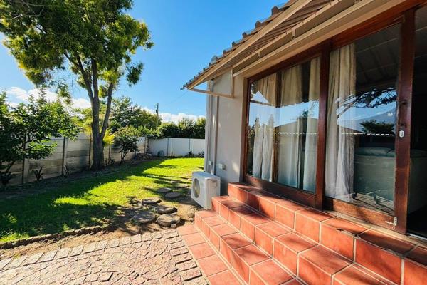 You&#39;ll love the two bathrooms and modern open kitchen with ample cupboard space. The built-in braai is perfect for entertaining ...