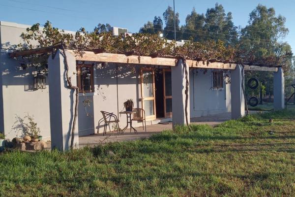 One- bedroom home to rent. This property features a dam as the front yard view.