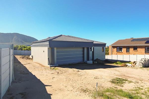 Introducing a stunning newly built house nestled in the serene beauty of Kleinbaai. This ...