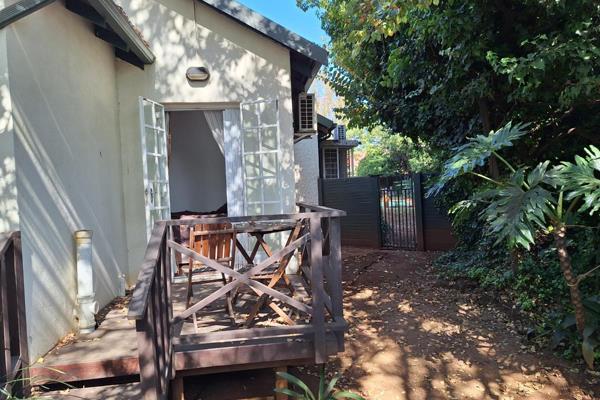 GARDEN COTTAGE  - A peaceful and secure retreat tucked away in the secure boomed off Suburb of Hurlyvale is ideal for those that ...