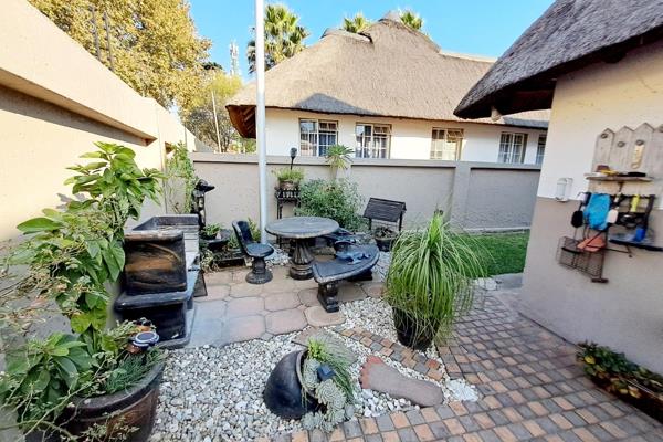 Discover the epitome of refined living in this captivating townhouse nestled within a charming thatch complex, situated in one of the ...