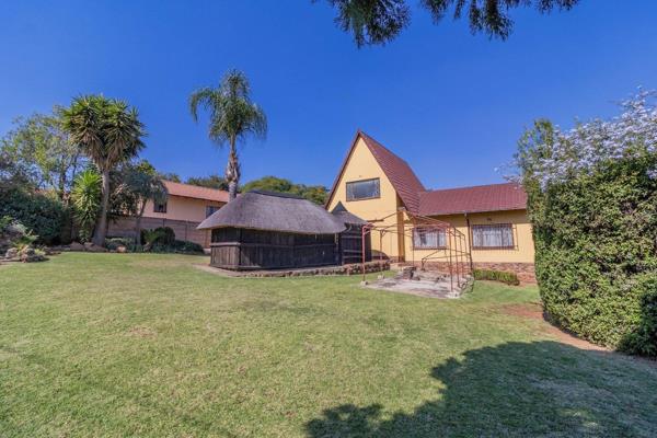 Step into the warmth and character of this delightful 1980s A-frame home, where inviting ...