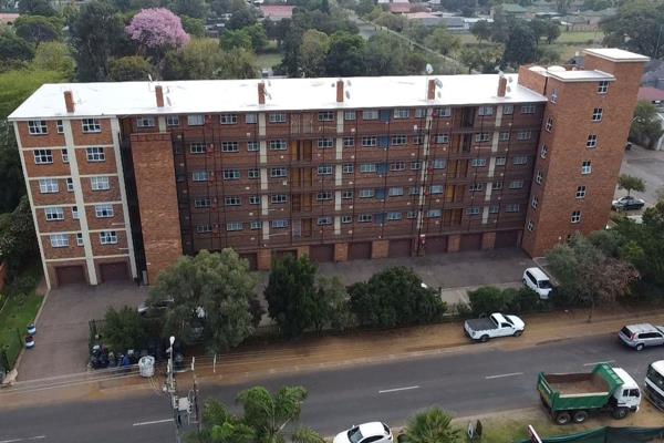 Nestled in the vibrant center of Rietfontein, this apartment presents a rare ...