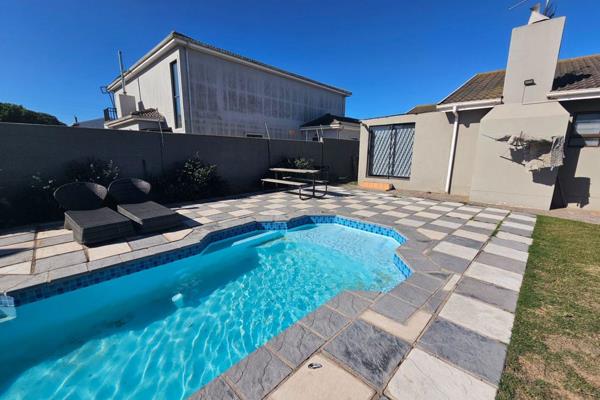*Lock-up-and-go family home with a swimming pool
*No extra levies payable
*Property ...