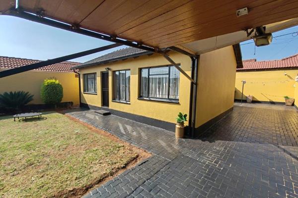 this 4 bedroom 2 full bathroom home also  offers full security with camera surveillance ...