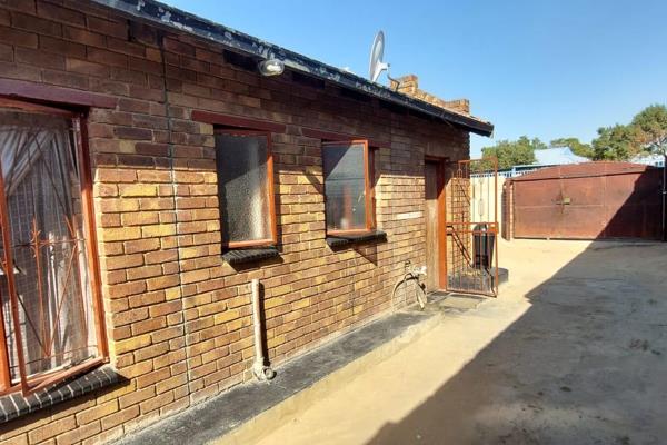 A 2 Bedroom, lounge, kitchen, bathroom and three outside rooms as well as a spaza shop. 
This property is currently utilized as a ...