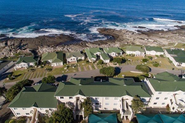 SOLE MANDATE - Discover coastal luxury in this ground floor apartment at Whale Rock ...