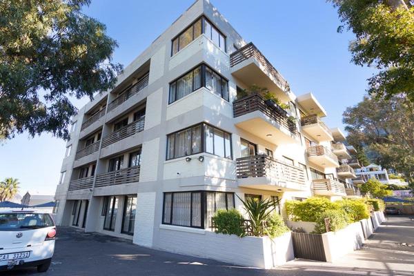 Experience the epitome of convenience and security in this stunning garden apartment ...