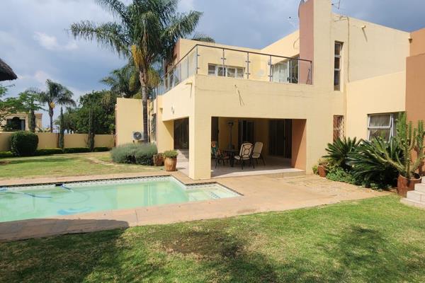 Immerse yourself in the lap of luxury with this amazing 4-bedroom home in Meyersdal ...