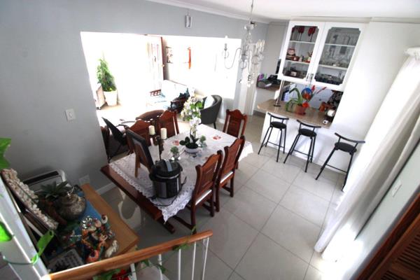 Exclusively marketed by Durbanville Properties...

This centrally located townhouse in Strand boasts an expansive living area ...