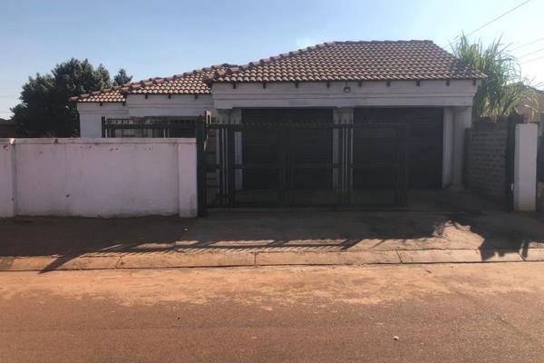 A 2 bedroom house with 2 living area, 2 bathroom,kitchen, walled fence  and double garage is for sale in Ga-Rankuwa Tsunami.