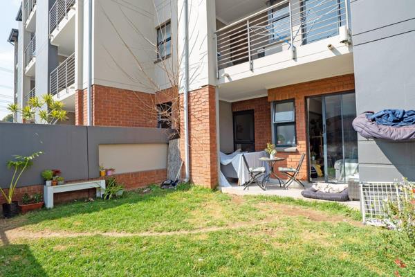 Lounge and dining room leading onto patio with built in braai
Kitchen with granite tops and gas cooking
Bedroom and ...