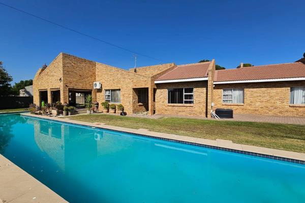 This exquisite brick house in a prime location offers the perfect blend of luxury and convenience. Features include:

4 spacious ...