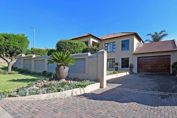 Architectural masterpiece - immaculate family home in 24 hour security enclosure. Kitchen includes an extractor fan, a glass top stove ...