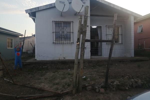 Two bedroom house, standing on a level ground behind locked gates is for grabs.

Well cared house with TV stand in lounge and ...