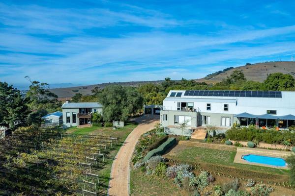 Perched high on a scenic hill, this approximately 8,825 m&#178; lifestyle estate offers ...