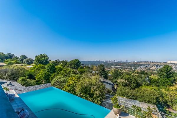 Experience unparalleled luxury in this stunning, recently built three-story home, perfectly situated in the prestigious Northcliff ...