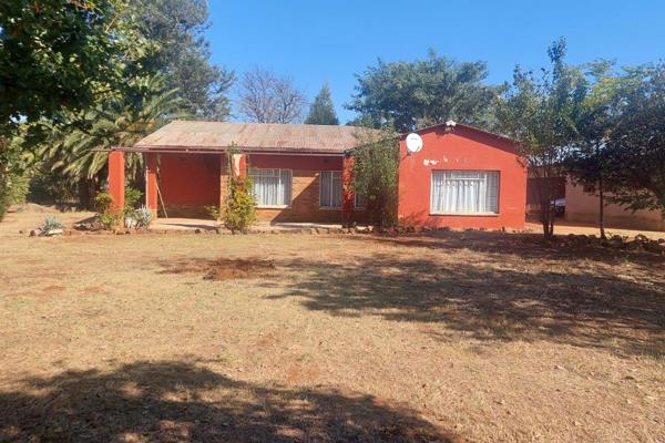 This smallholding offers you house with 4 bedrooms. 1 Bathroom. Lounge and dining room. Kitchen with Built-in cupboards and tiled ...