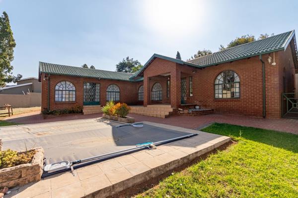 As you step inside, you&#39;re greeted by an expansive open-plan living and dining area that exudes warmth and elegance. Natural light ...