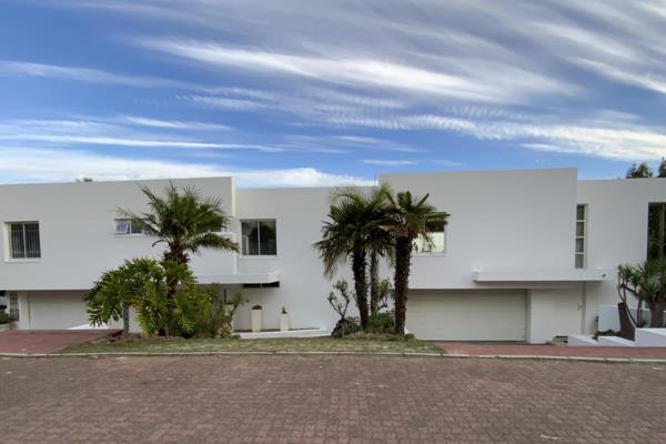 This impressive six-bedroom residence offers stunning panoramic views of Table Mountain and the sea, comprising two separate dwellings ...