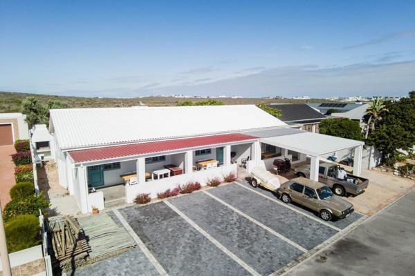 Escape to the serene coastal town of Yzerfontein and make this furnished rental your temporary home, Offering a peaceful ...