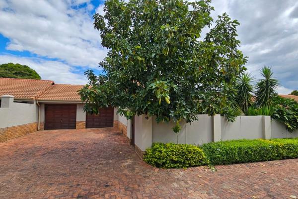 This lovely townhouse offers an open plan living lounge and dining area that leads onto ...