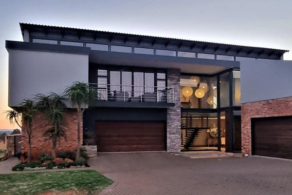 Welcome to your dream property just outside Potchefstroom, where tranquility meets architectural brilliance on just over a hectare of ...