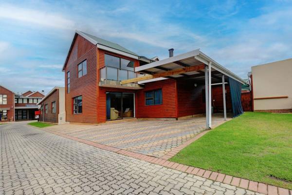 Unfurnished 4 bedroom, 2.5 bathroom dual level house to rent in Hartenbos in secure complex.  Open plan lounge with braai area and ...