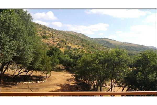 This 81-hectare farm near Boshoek, located 30km from Sun City, features over half of its area as mountainous terrain. The main ...