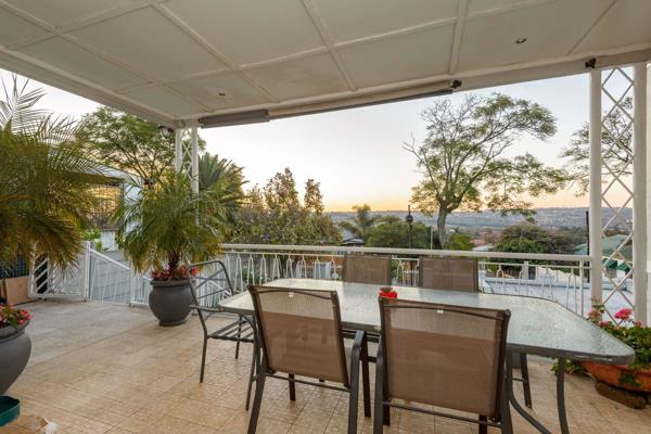 Nestling Securely Against a North-Facing Hill, This Special Family home awaits you. 
The first impression is imposing, a pristine white ...