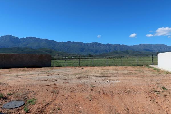 Nestled beneath the Langeberg Mountains -this estate offers a picturesque setting and a ...