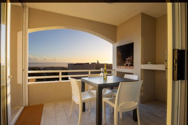 This charming beachfront apartment at Galleon Beach in Melkboschstrand, is your gateway ...