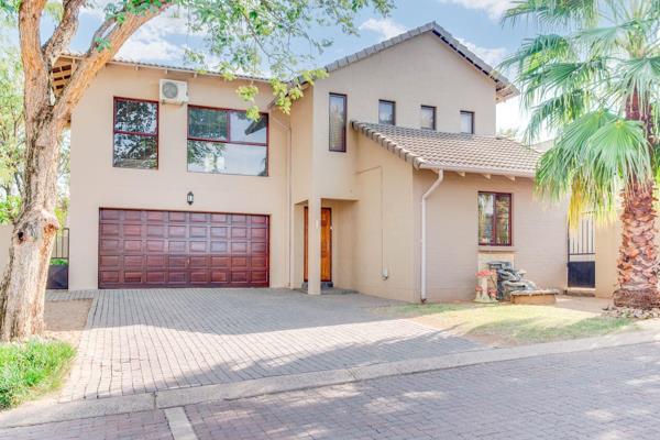 This stunning property, is marketed under exclusive mandate and offers a spacious living ...