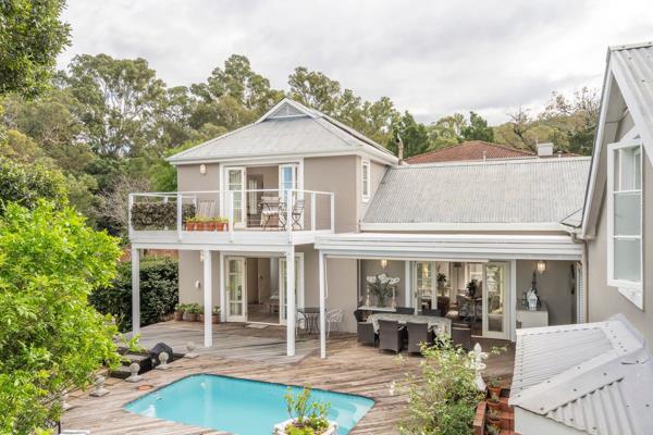 Joint Mandate: Nestled in a woodland garden near Knysna central, this beloved 3-bedroom ...