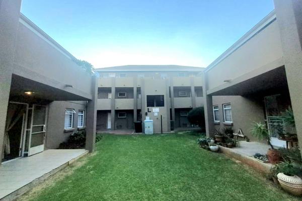 Neat three bedroom townhouse | ground floor | secure complex with swimming pool and ...