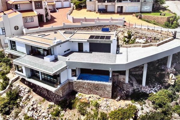 EXCLUSIVE SOLE MANDATE

Welcome to your dream retreat perched atop the majestic cliffs of Mossel Bay, boasting unparalleled panoramic ...