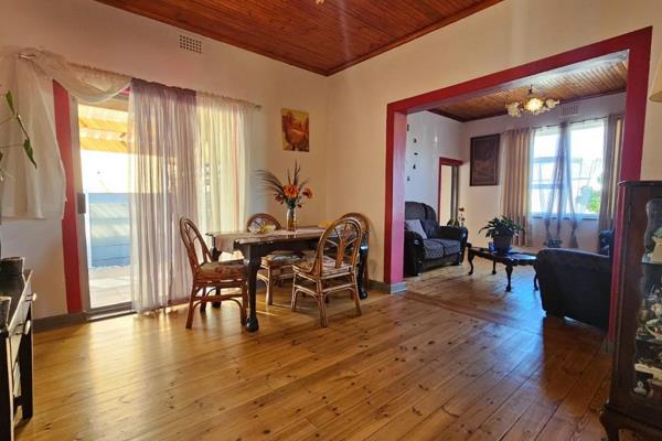 Step into elegance with this spacious 3-bedroom home boasting timeless wooden flooring ...